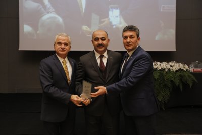 FUAR KONGRE MERKEZİNE EMEĞİ GEÇENLERE TEŞEKKÜR PLAKETİ